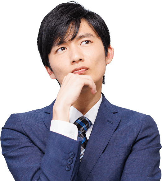 考えている男性の写真